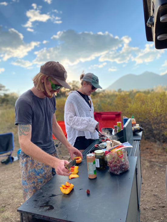 Sunset dinner on hitch mounted camp kitchen